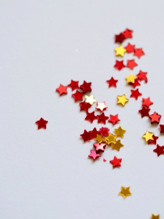 stars confetti on white background